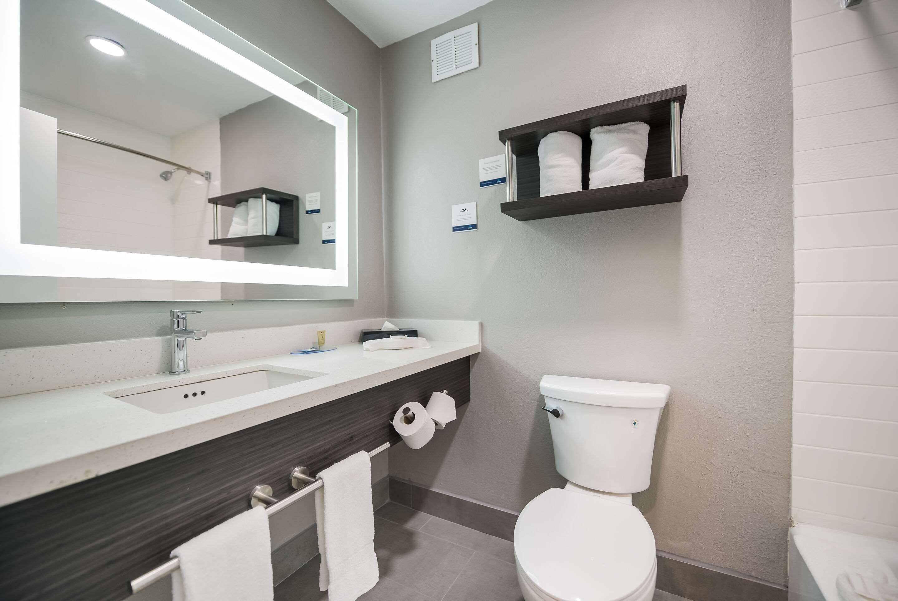 desk, laptop workspace, blackout curtains, iron/ironing board