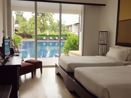 Deluxe Room, Pool Access | 1 bedroom, minibar, in-room safe, desk