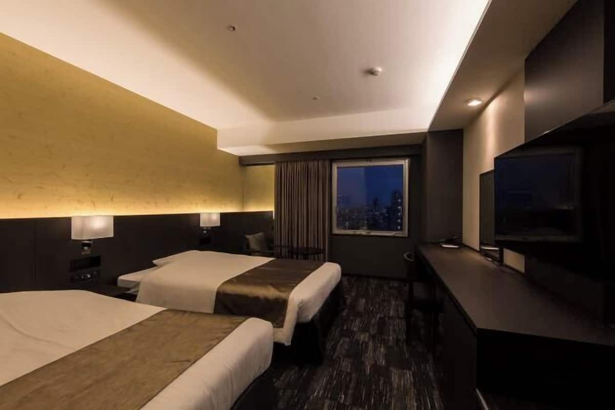 1 dormitorio, ropa de cama de alta calidad, escritorio