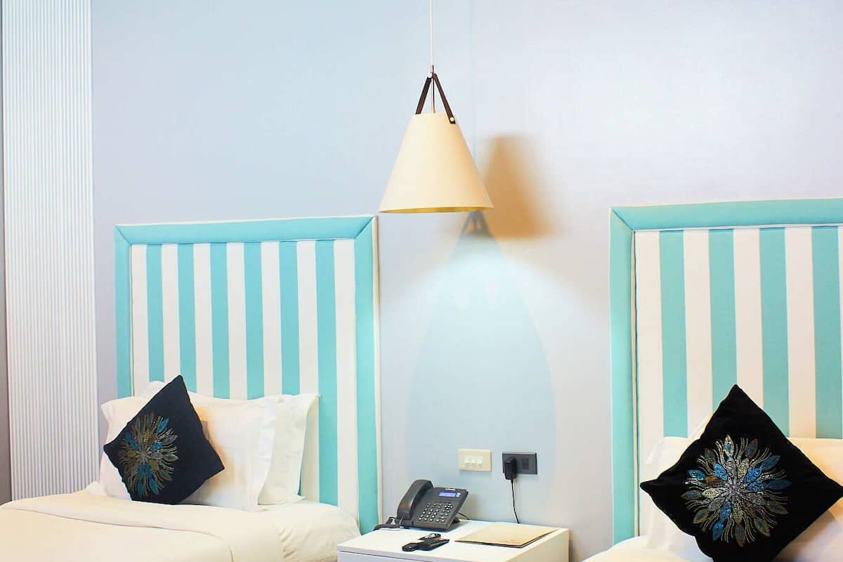 superior twin room, 2 single beds | minibar, in-room safe, blackout curtains