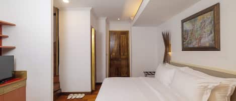 Dúplex Deluxe | Minibar, escritorio, wifi y ropa de cama