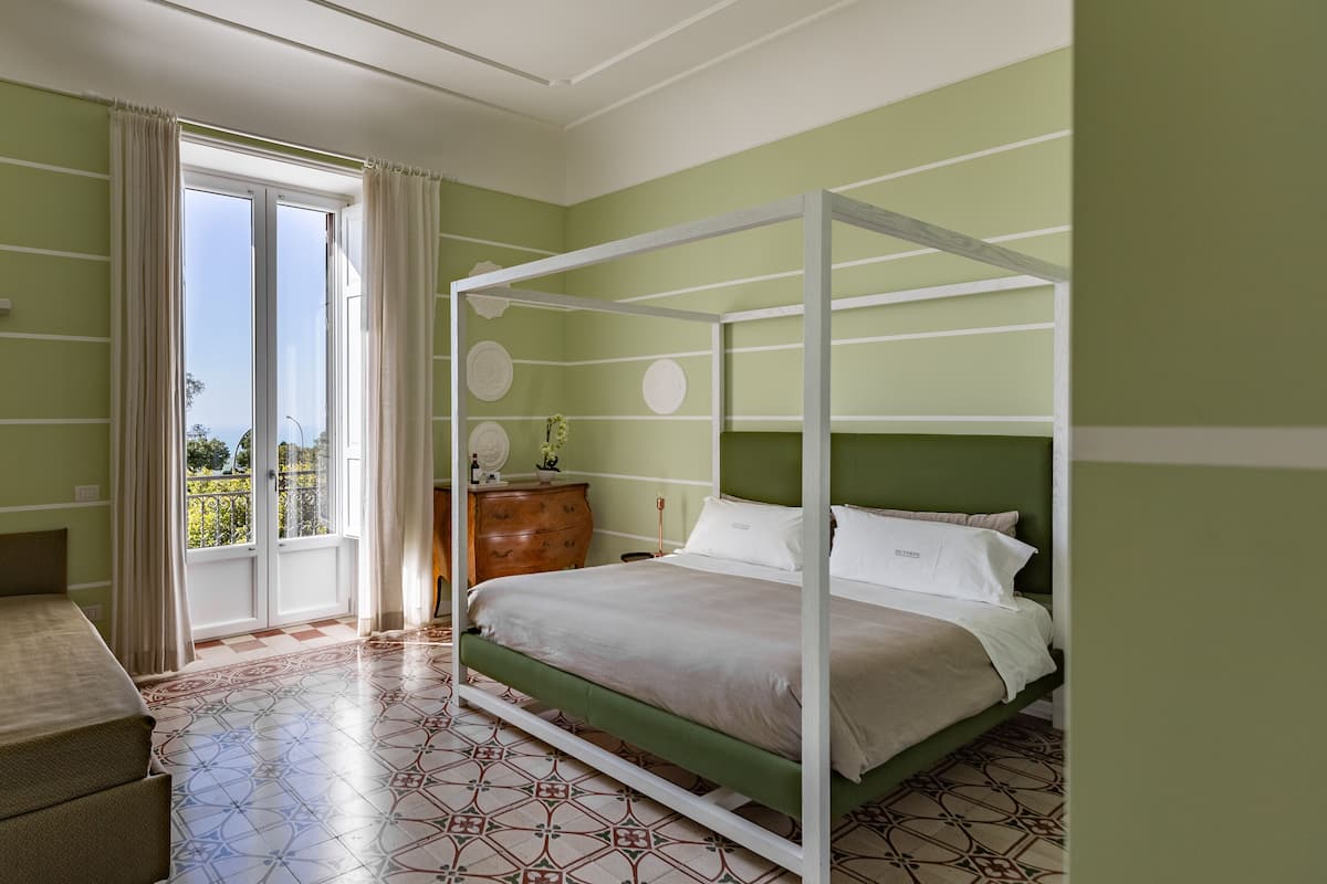 Luxury Suite, Balcony | Premium bedding, minibar, in-room safe, desk