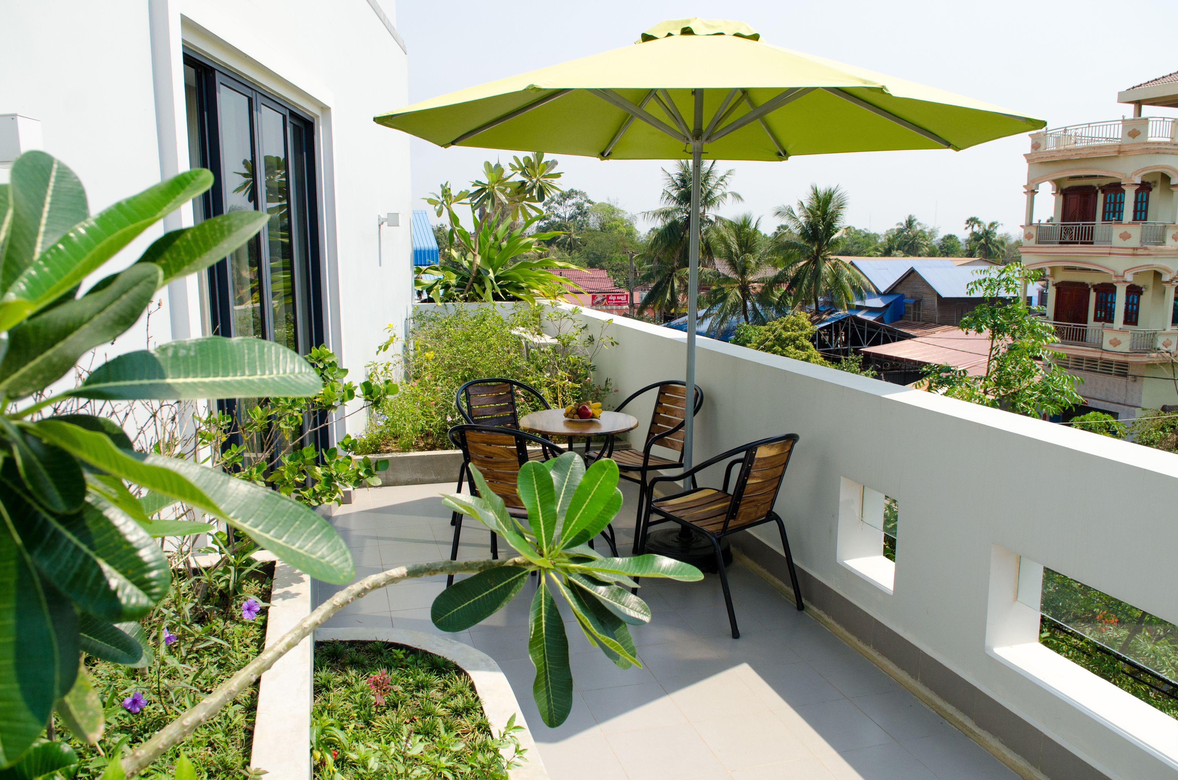 family suite, multiple beds, balcony, pool view | balcony