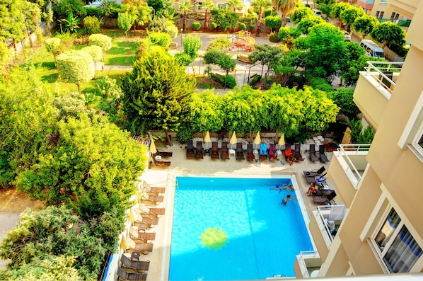 Outdoor pool, pool umbrellas, pool loungers