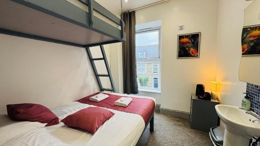 Economy Twin Room, Shared Bathroom (Budget) | Iron/ironing board, free WiFi, bed sheets