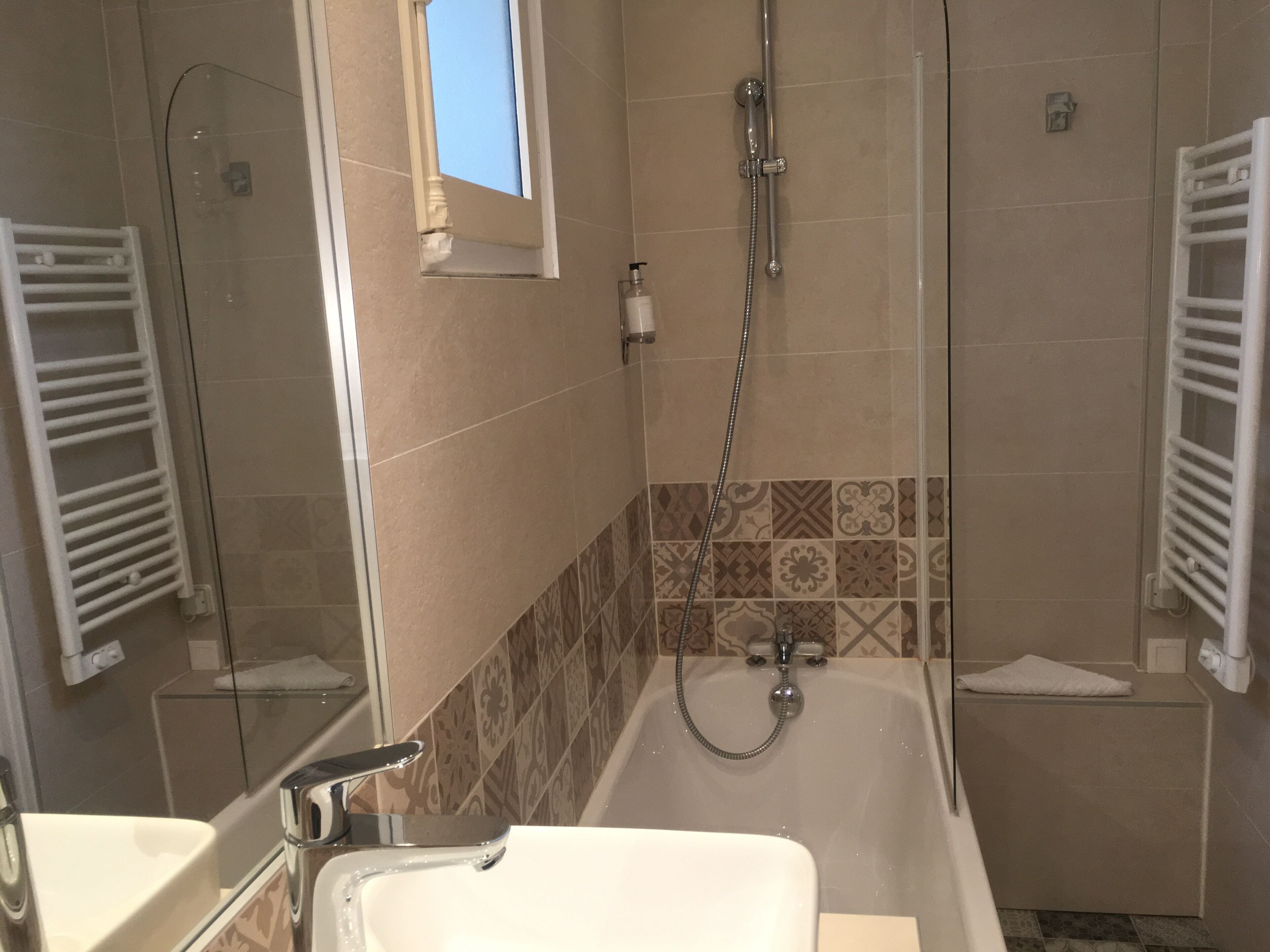 classic double room | bathroom | deep-soaking bathtub, hair dryer, towels