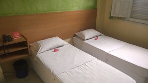 Tvåbäddsrum | Minibar, skrivbord och gratis wi-fi