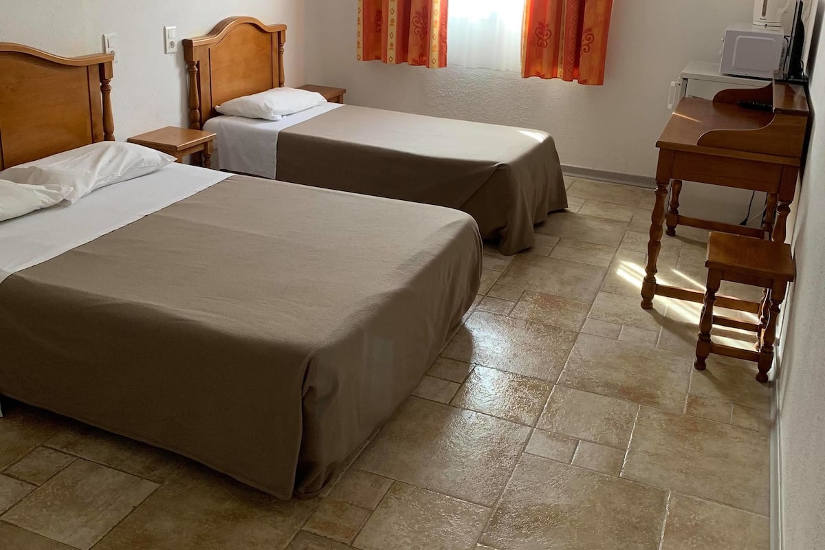 Dreibettzimmer | 1 Schlafzimmer, individuell dekoriert, individuell eingerichtet