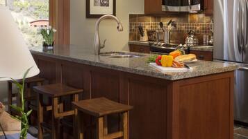 Premier Room, 1 Bedroom | Private kitchen | Microwave, coffee/tea maker, cookware/dishes/utensils, dining tables