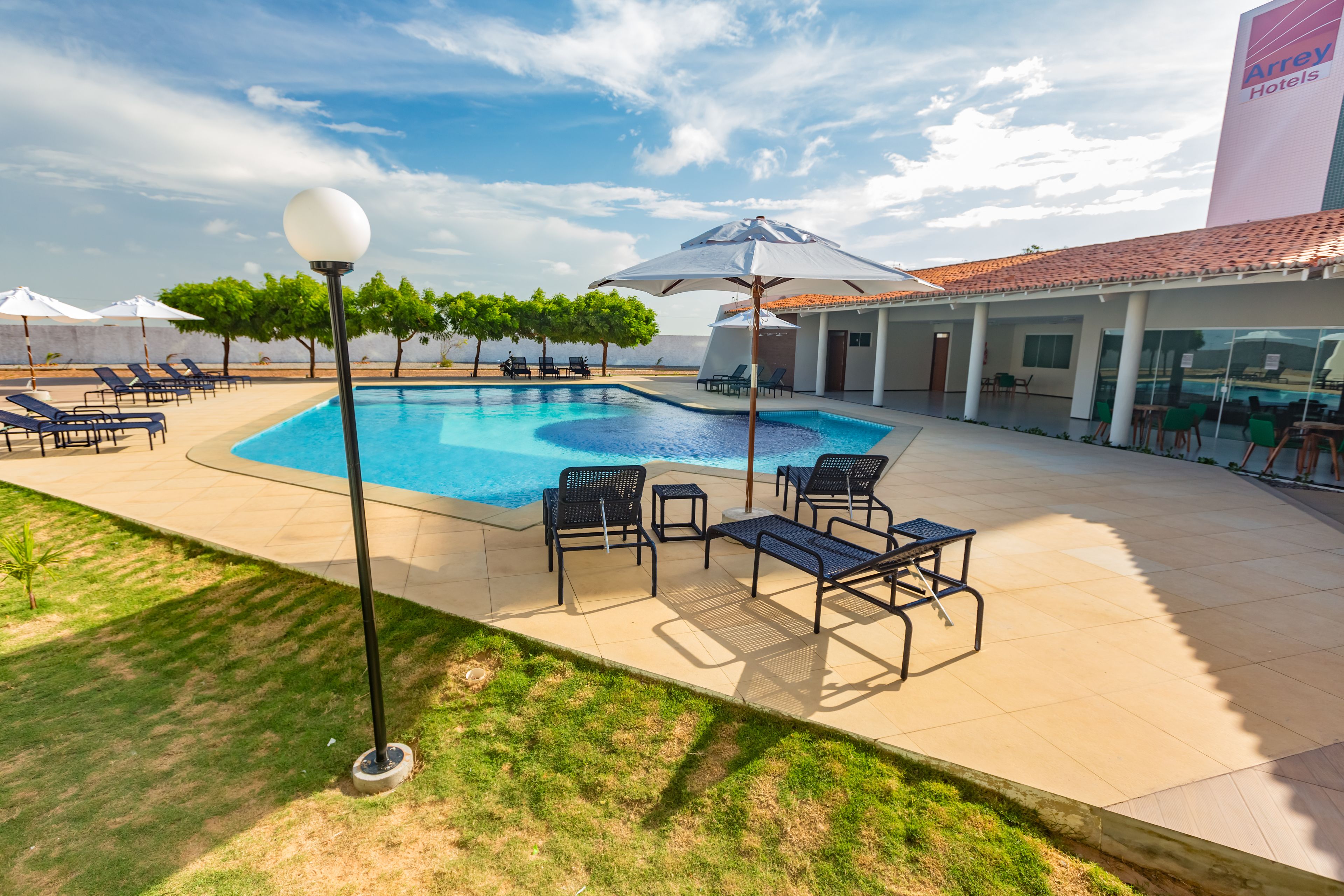 outdoor pool, open 8:30 am to 10:00 pm, pool loungers