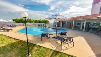Outdoor pool, open 8:30 AM to 10:00 PM, pool loungers