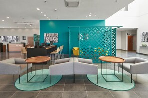 Relax and work in style with comfortable seating and modern amenities.