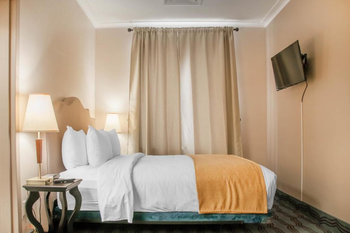Pillowtop beds, desk, laptop workspace, iron/ironing board