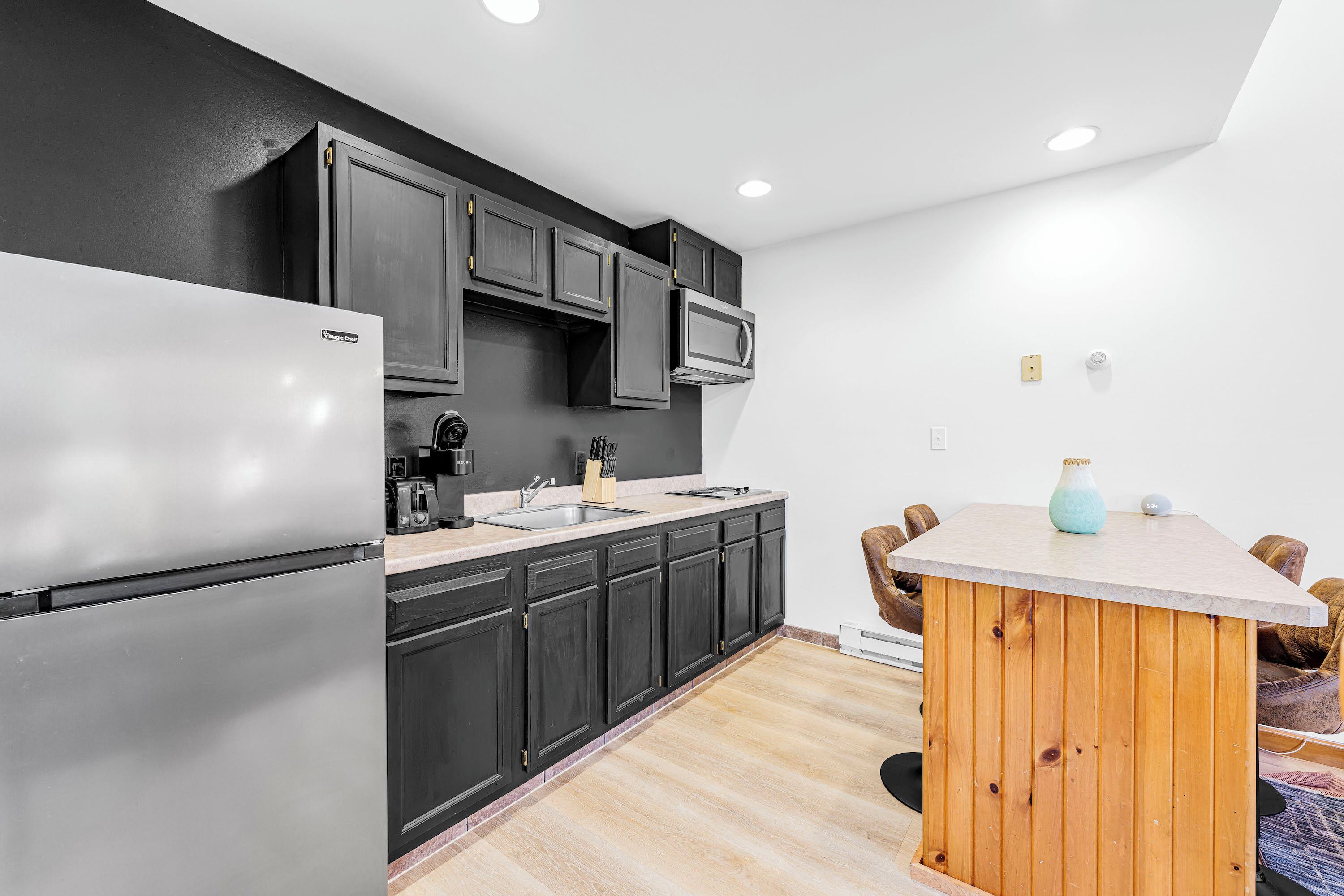 two bedroom cabin | private kitchen | fridge, cookware/dishes/utensils