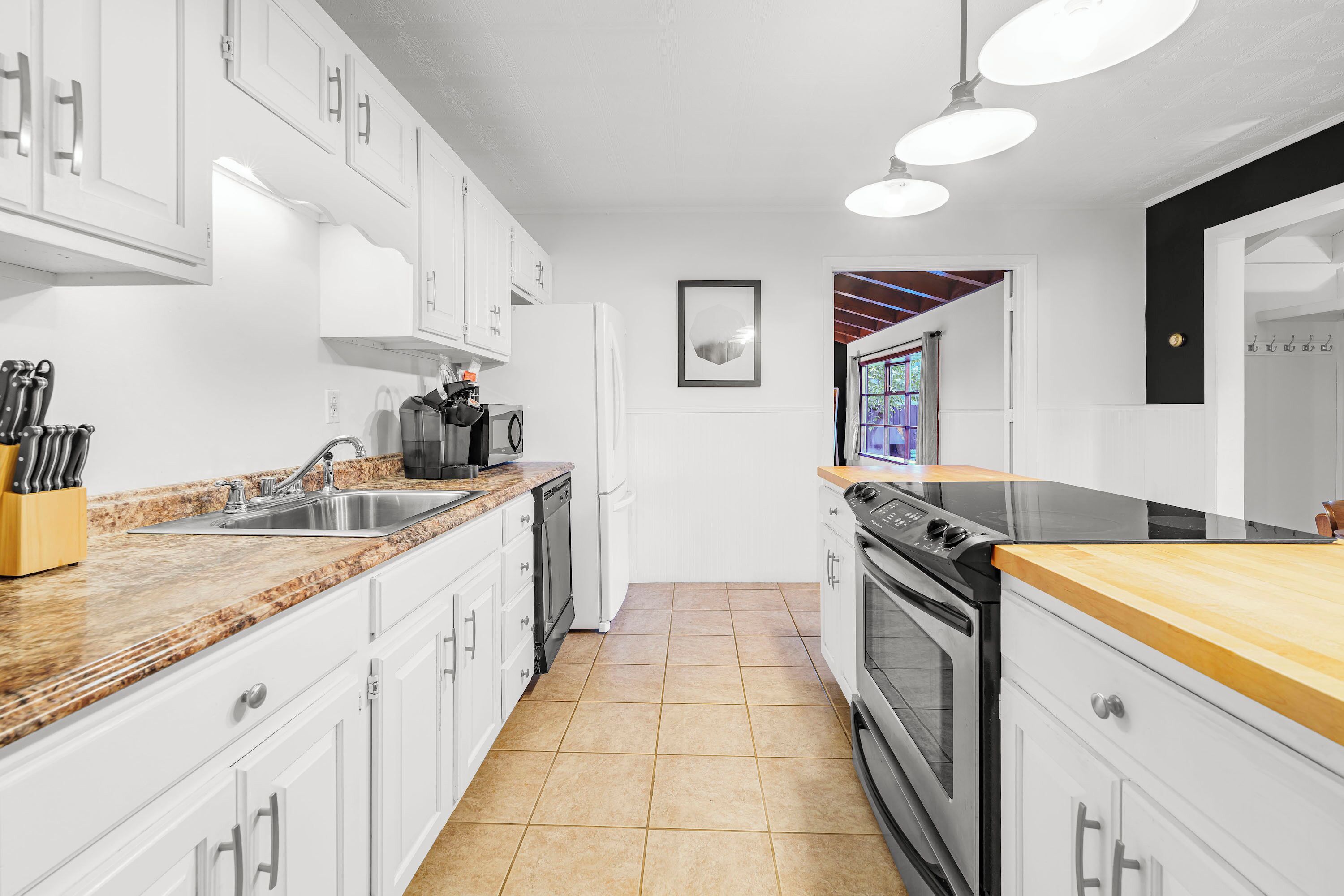 one bedroom suite | private kitchen | fridge, cookware/dishes/utensils