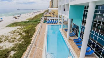 Outdoor pool, open 10:00 AM to 10:00 PM, pool umbrellas, pool loungers