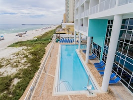 Outdoor pool, open 10:00 AM to 10:00 PM, pool umbrellas, sun loungers