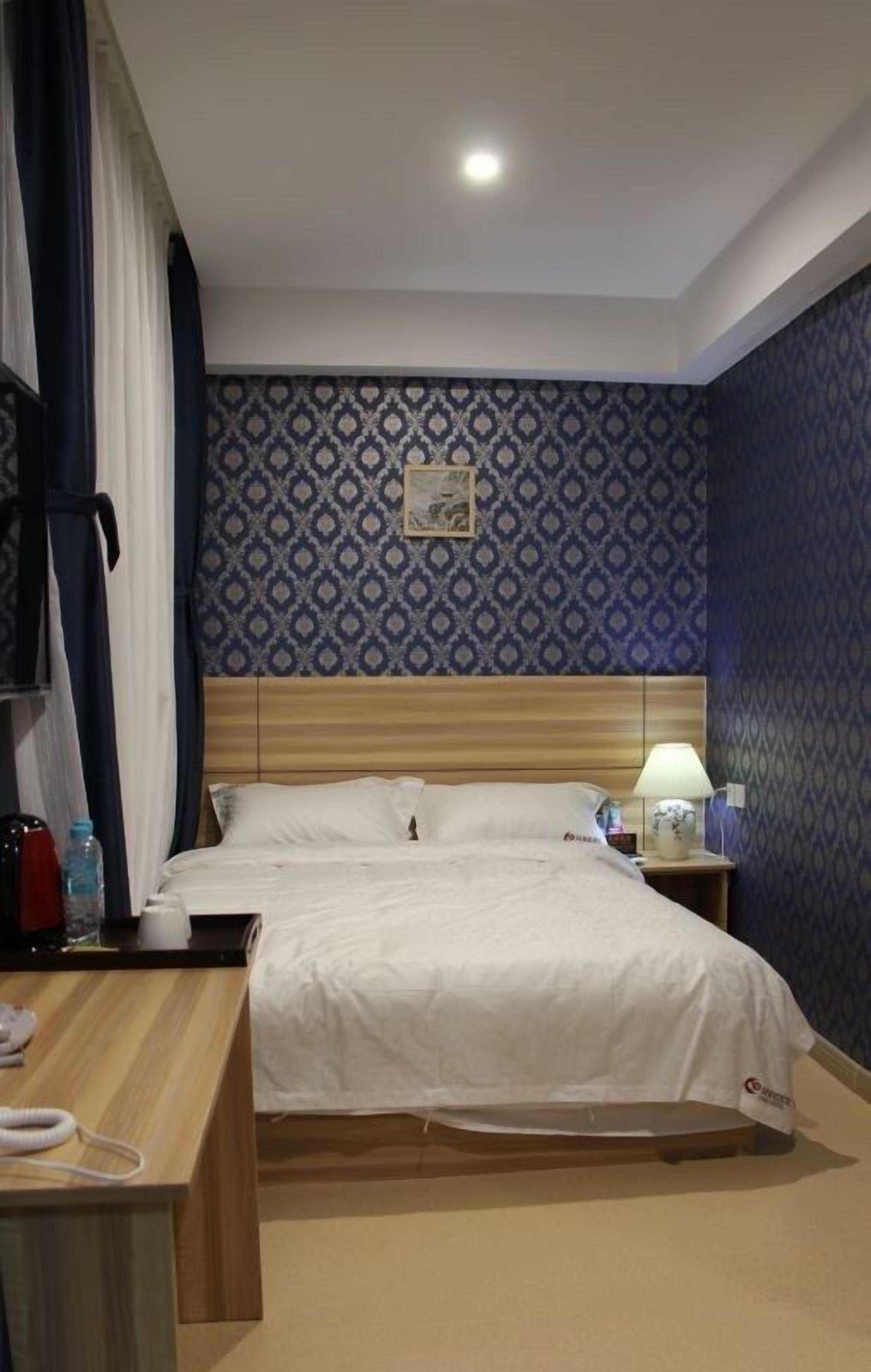 premium bedding, select comfort beds, desk, blackout curtains