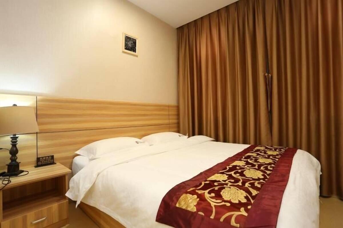 Premium bedding, Select Comfort beds, desk, blackout drapes