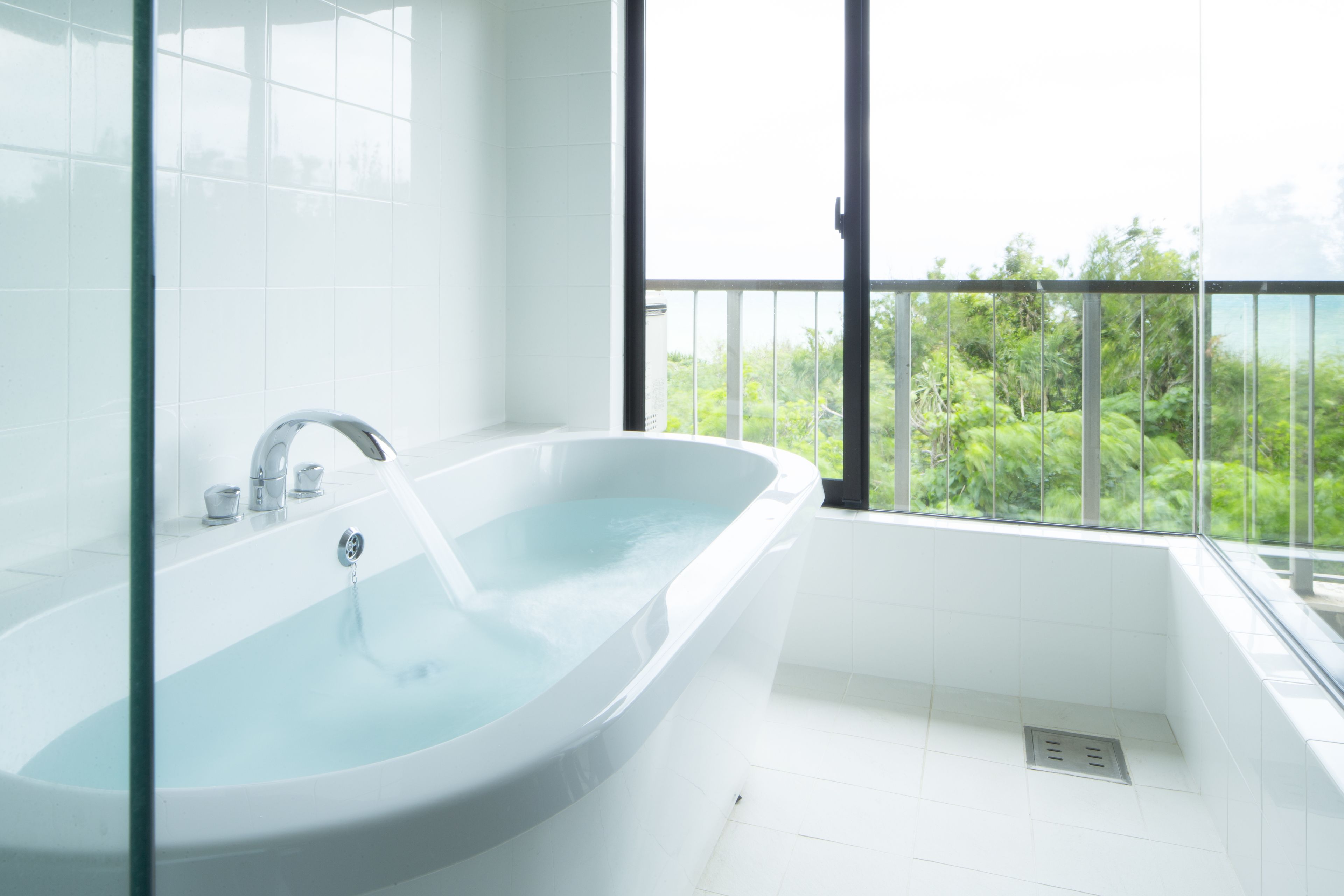 superior suite | bathroom | separate bathtub and shower, deep-soaking bathtub, free toiletries