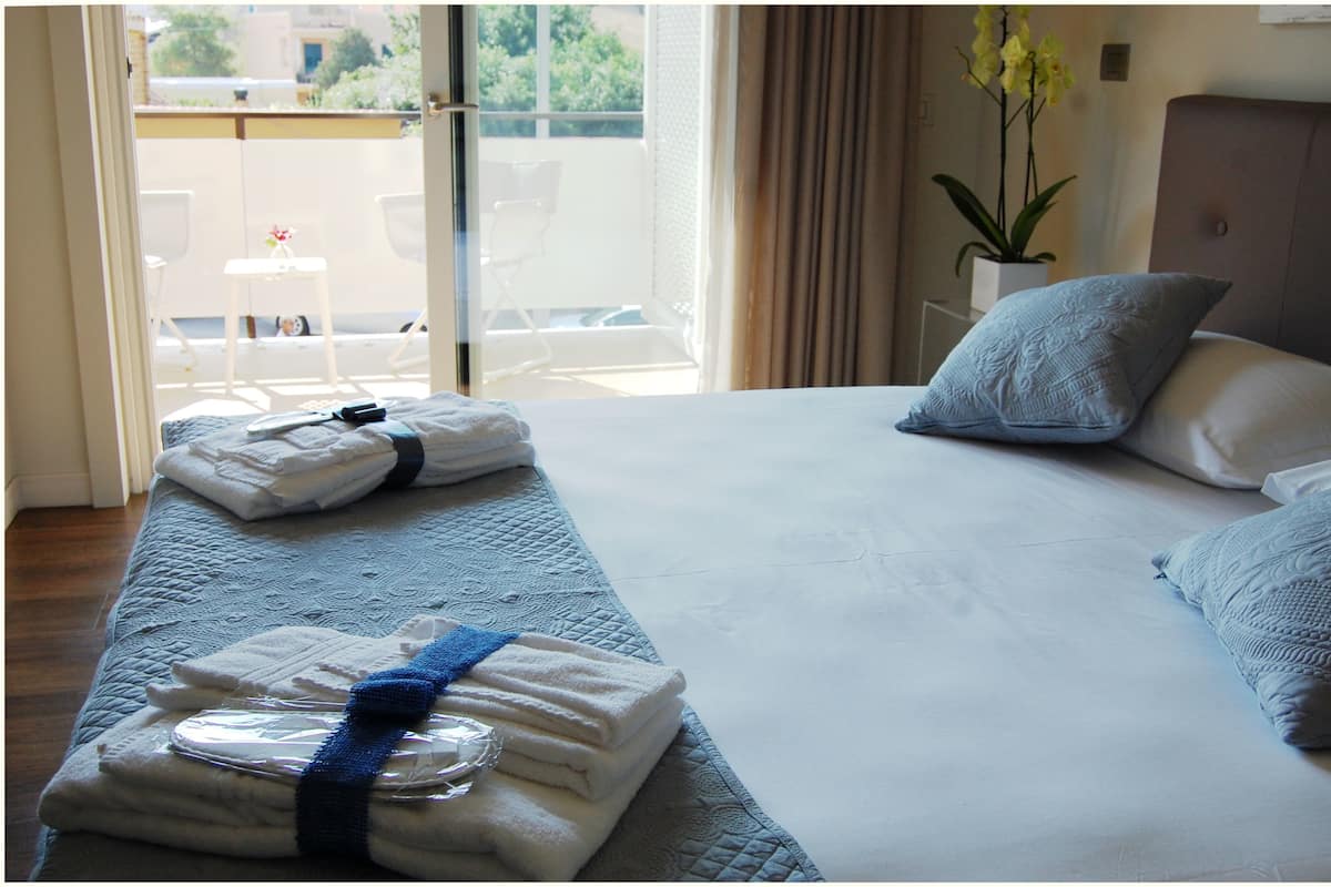 Down comforters, minibar, in-room safe, individually decorated