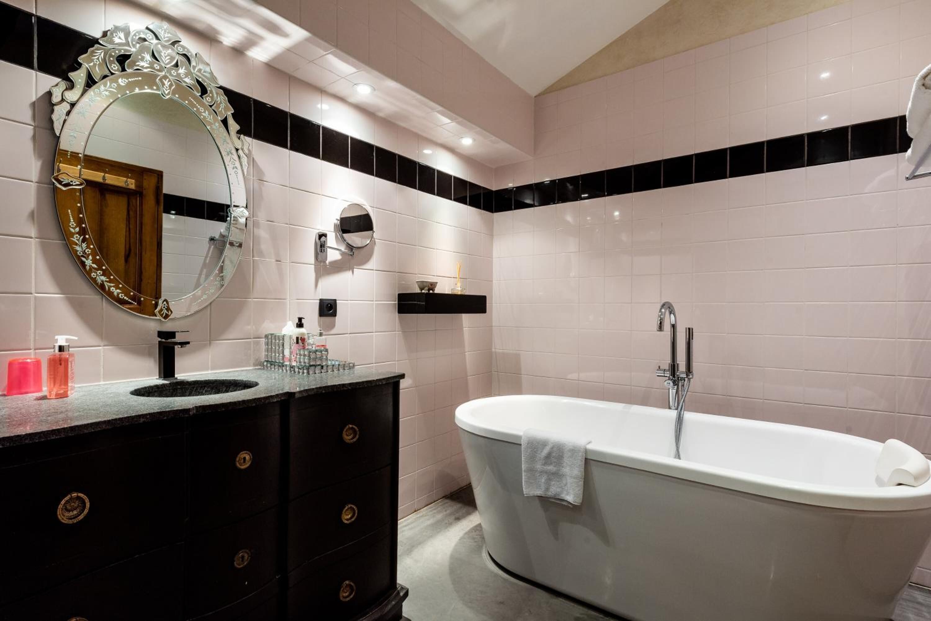 separate bathtub and shower, free toiletries, hair dryer, bathrobes