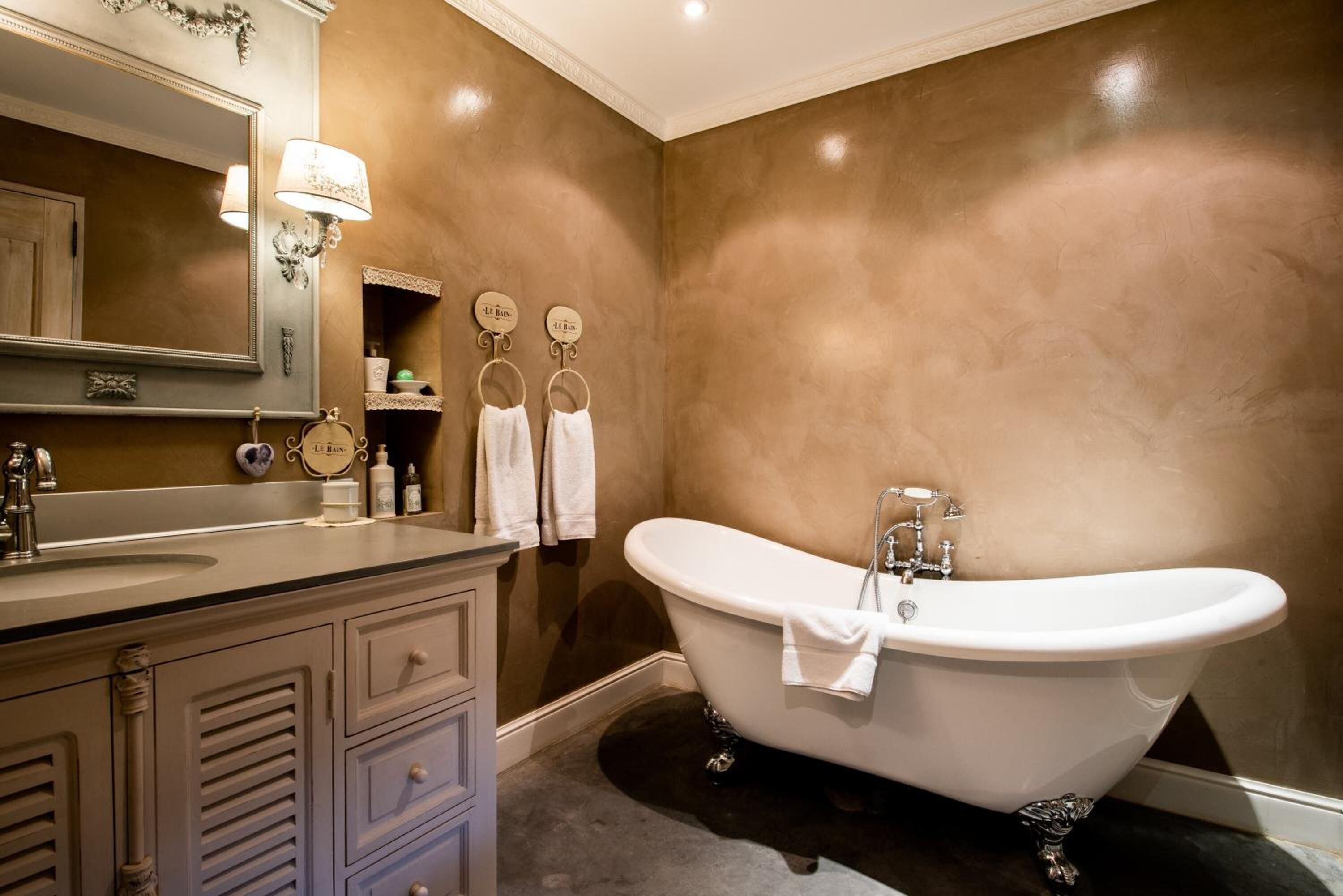 separate bathtub and shower, free toiletries, hair dryer, bathrobes