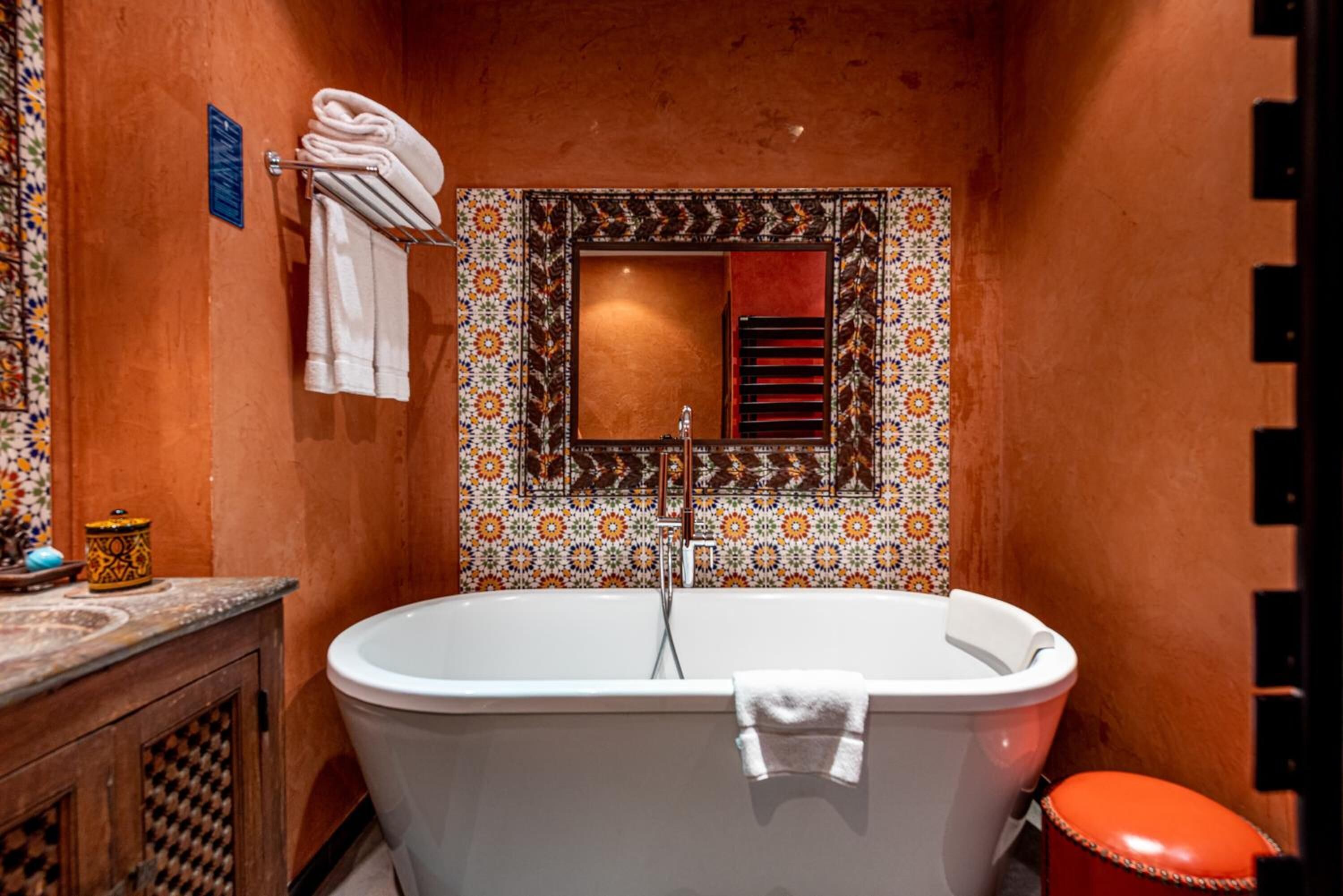 separate bathtub and shower, free toiletries, hair dryer, bathrobes