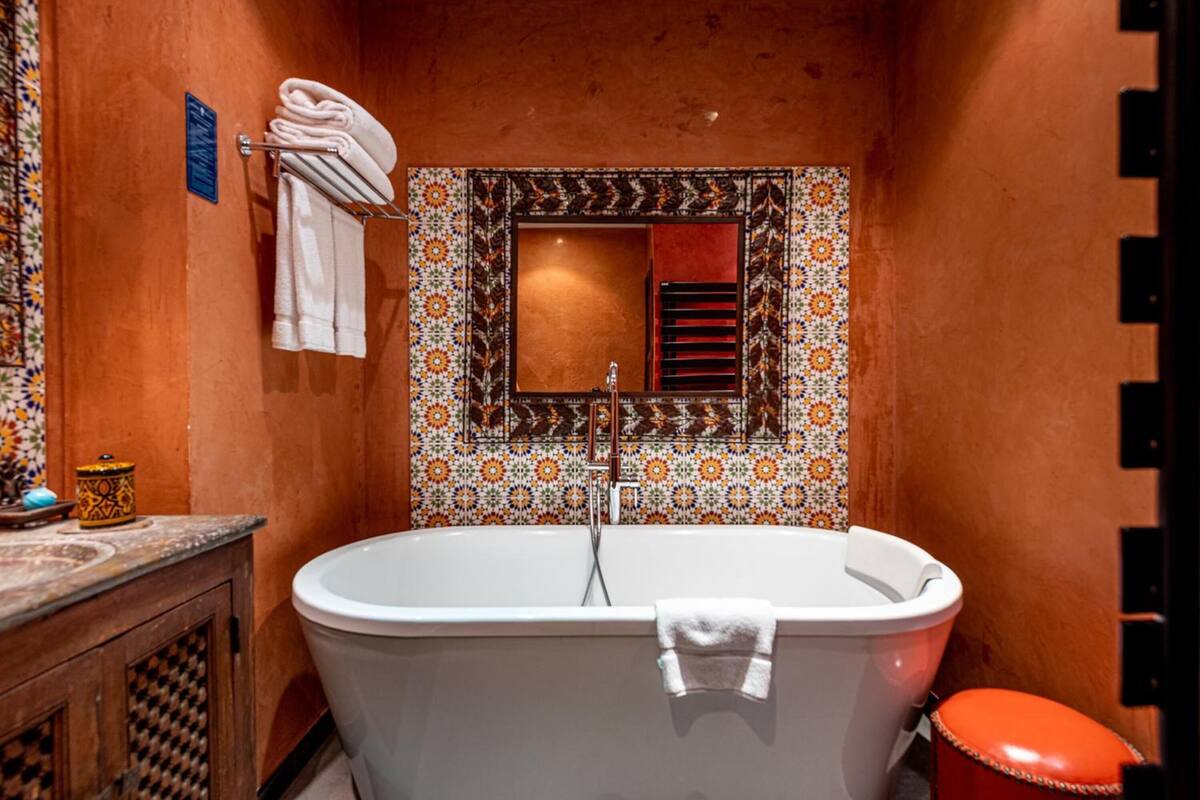 separate bathtub and shower, free toiletries, hair dryer, bathrobes