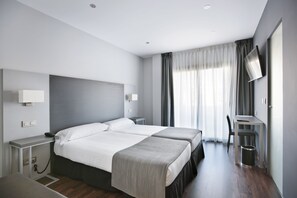 Doppel- oder Zweibettzimmer