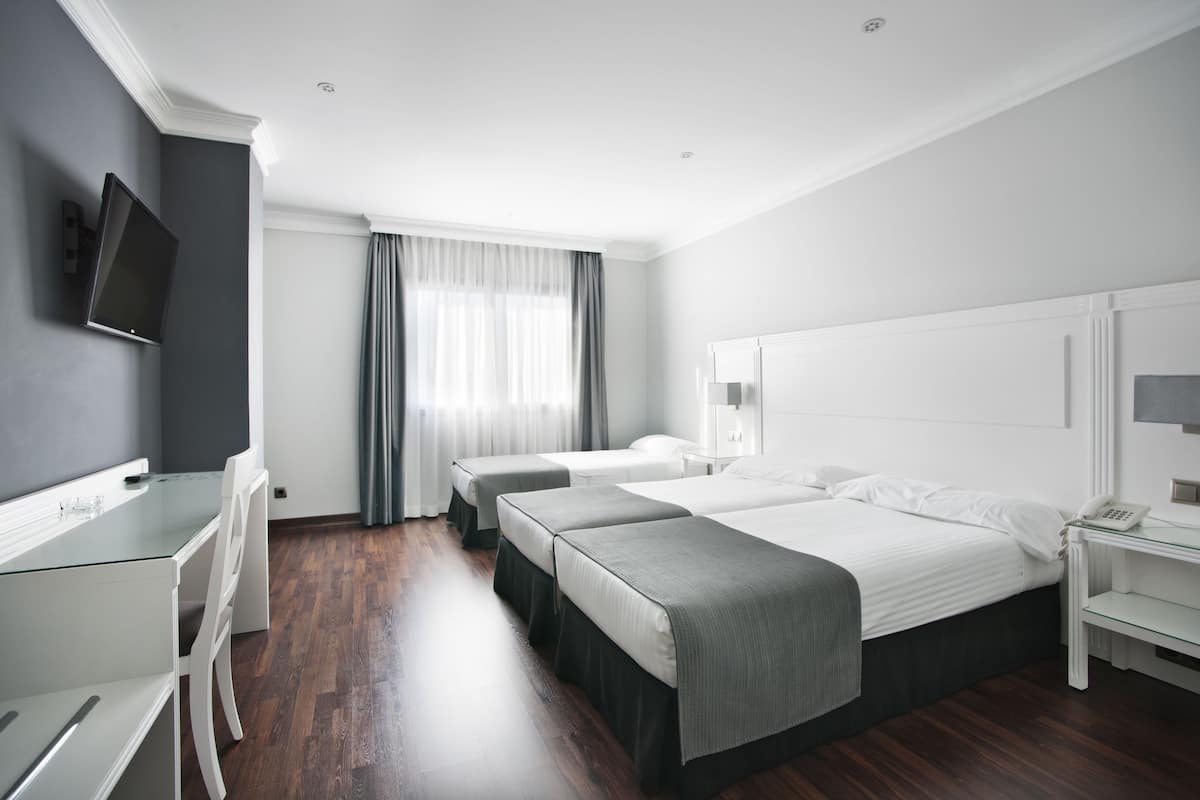 Triple Room | Premium bedding, minibar, in-room safe, individually furnished