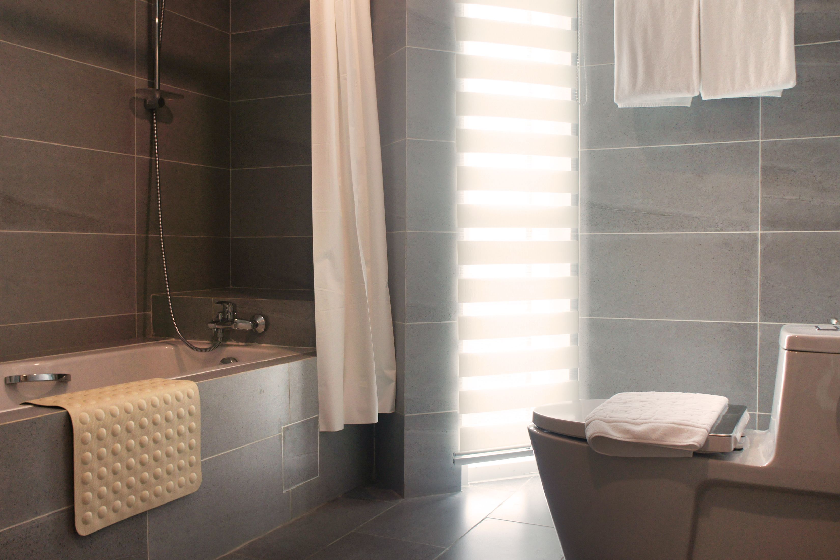 premier king | bathroom | free toiletries, hair dryer, bathrobes, slippers