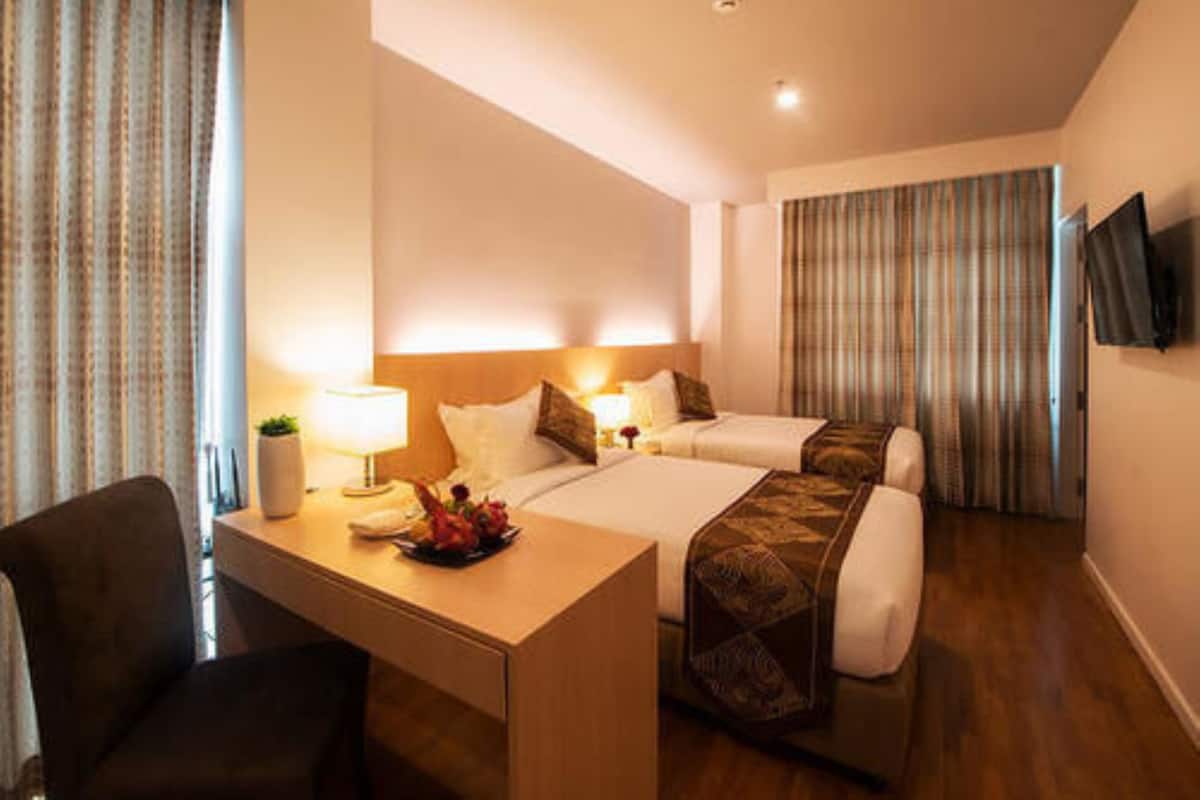 Suite familiar | Minibar, caja fuerte, escritorio y sistema de insonorización