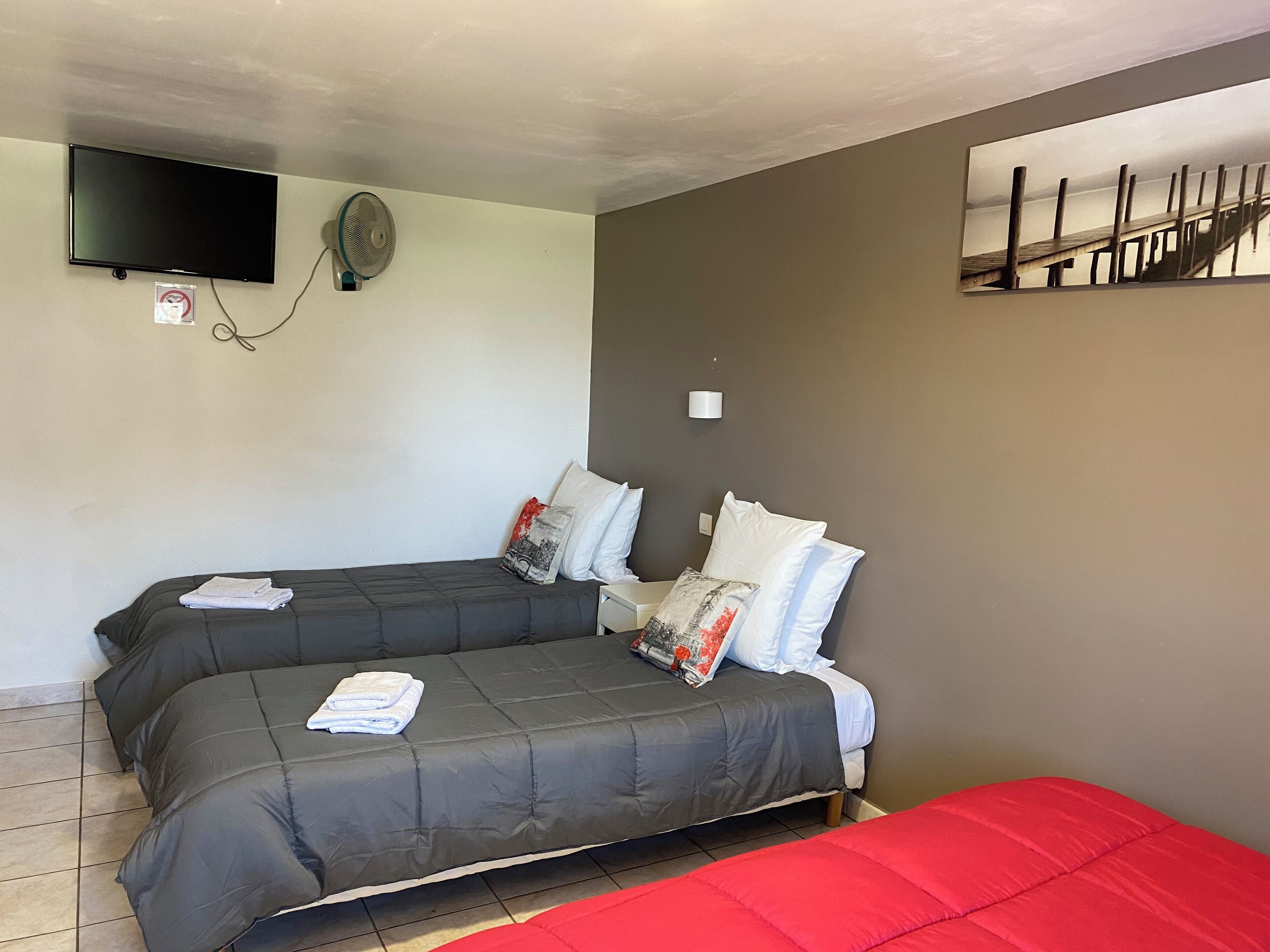 family room, ensuite, city view | premium bedding, memory-foam beds, in-room safe, individually decorated