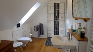 Deluxe Double or Twin Room, Balcony, Garden View | Bathroom | Shower, hair dryer, slippers, towels