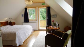 Deluxe Double or Twin Room, Balcony, Garden View | 1 bedroom, premium bedding, in-room safe, individually decorated