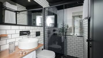 Shower, free toiletries, hair dryer, slippers