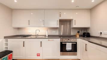 Departamento, 1 habitación | Cocina privada | Refrigerador, microondas, horno y parrilla de estufa