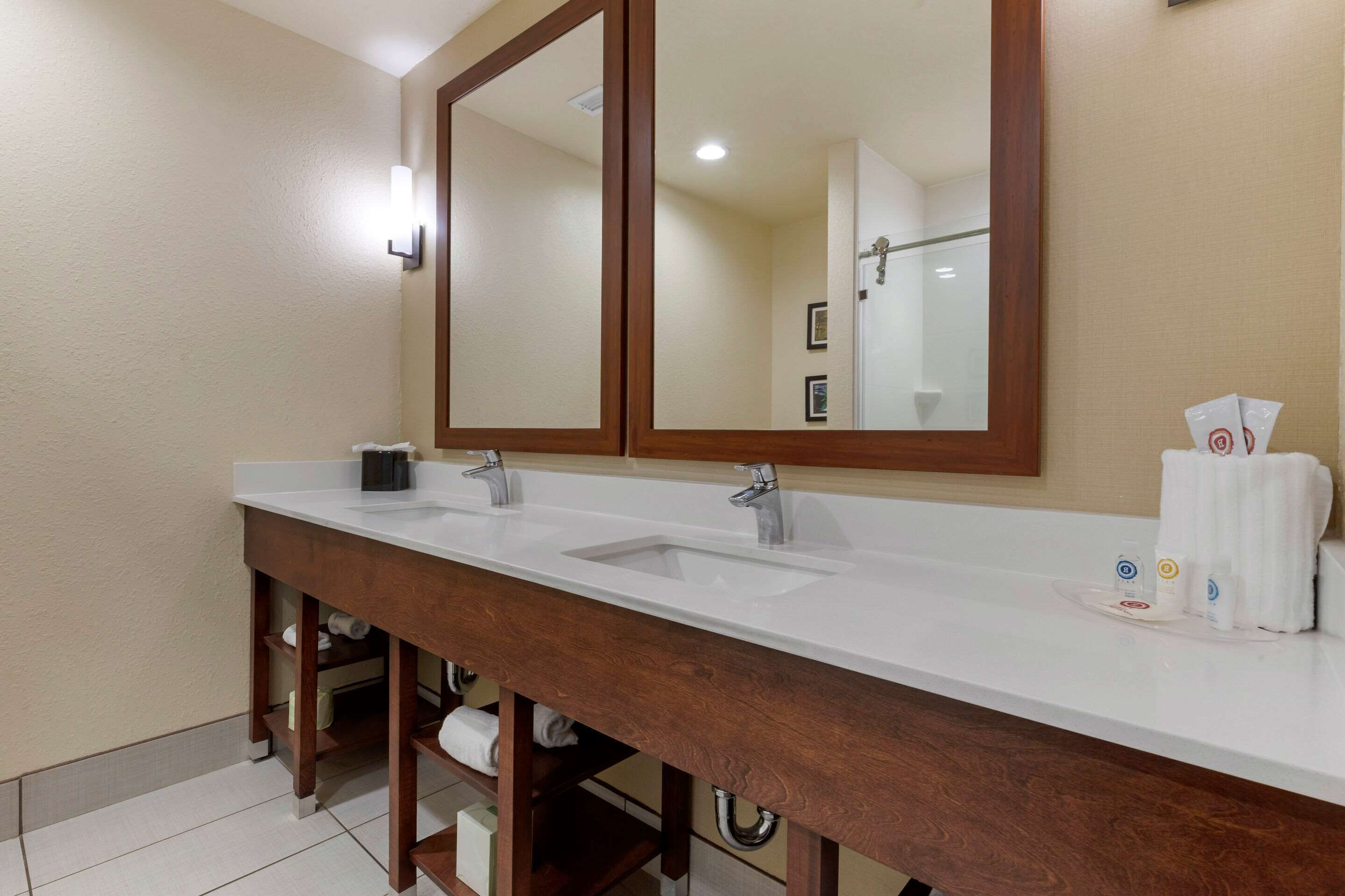 suite, multiple beds (large) | bathroom | free toiletries, hair dryer, towels