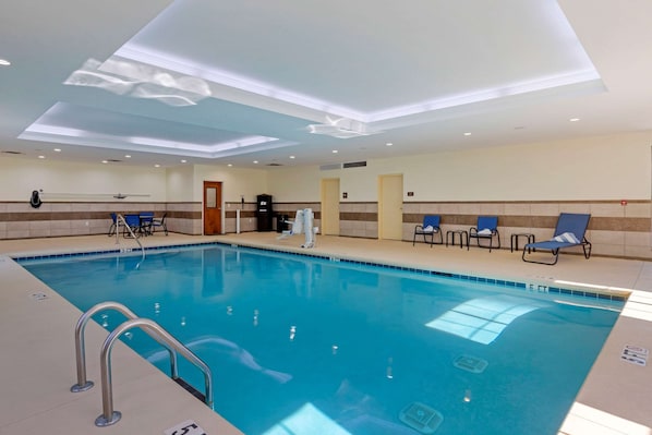 Indoor pool, pool umbrellas, sun loungers