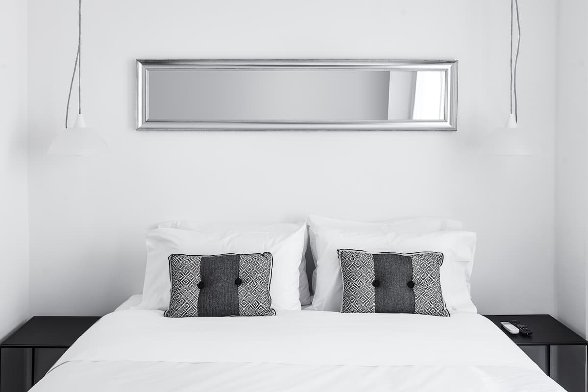 Premium bedding, down duvets, pillow-top beds, in-room safe