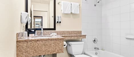 Superior Room, 1 King Bed, Non Smoking | Bathroom | Combined shower/tub, free toiletries, hair dryer, towels