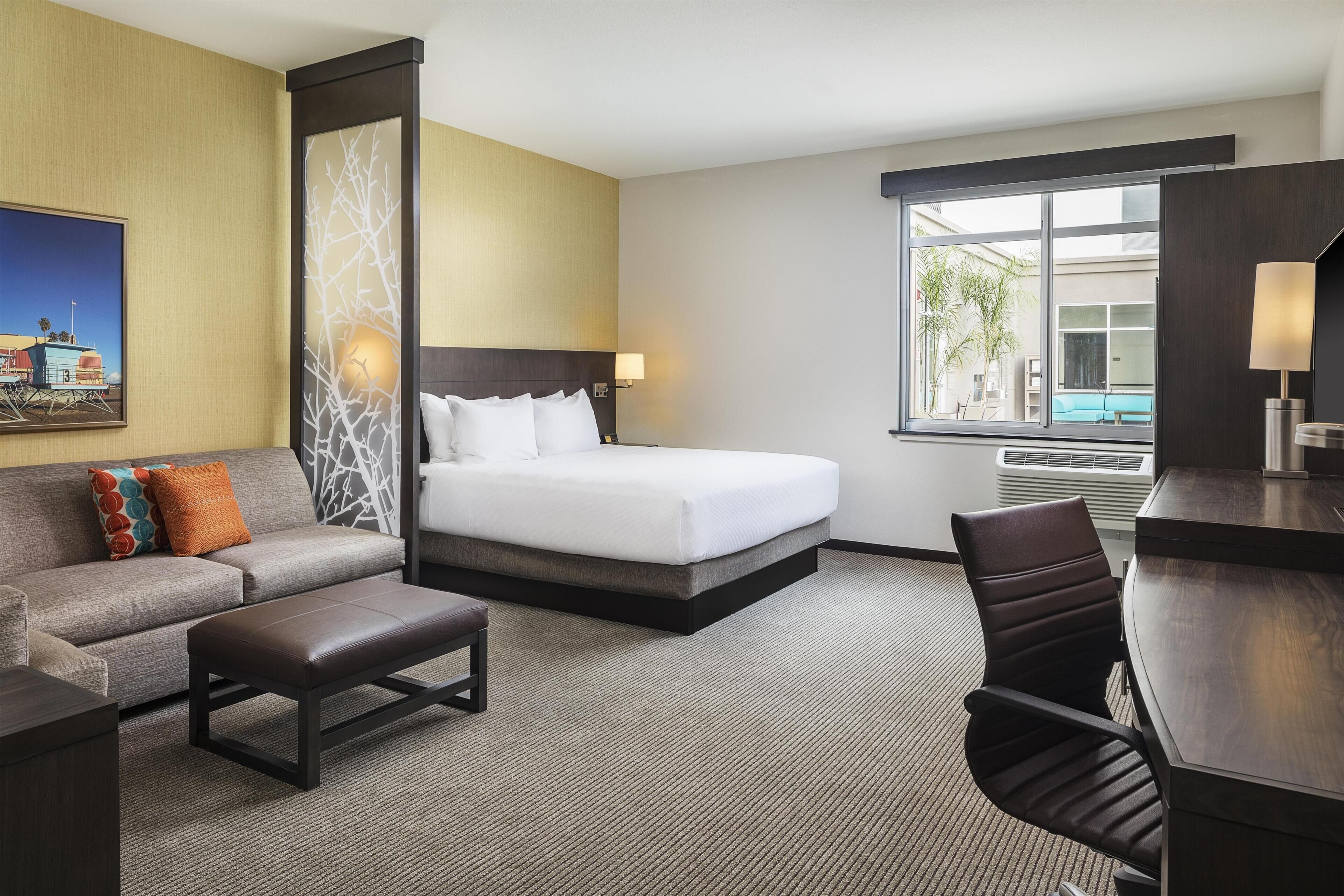 Room, 1 King Bed with Sofa bed | In-room safe, desk, laptop workspace, blackout drapes