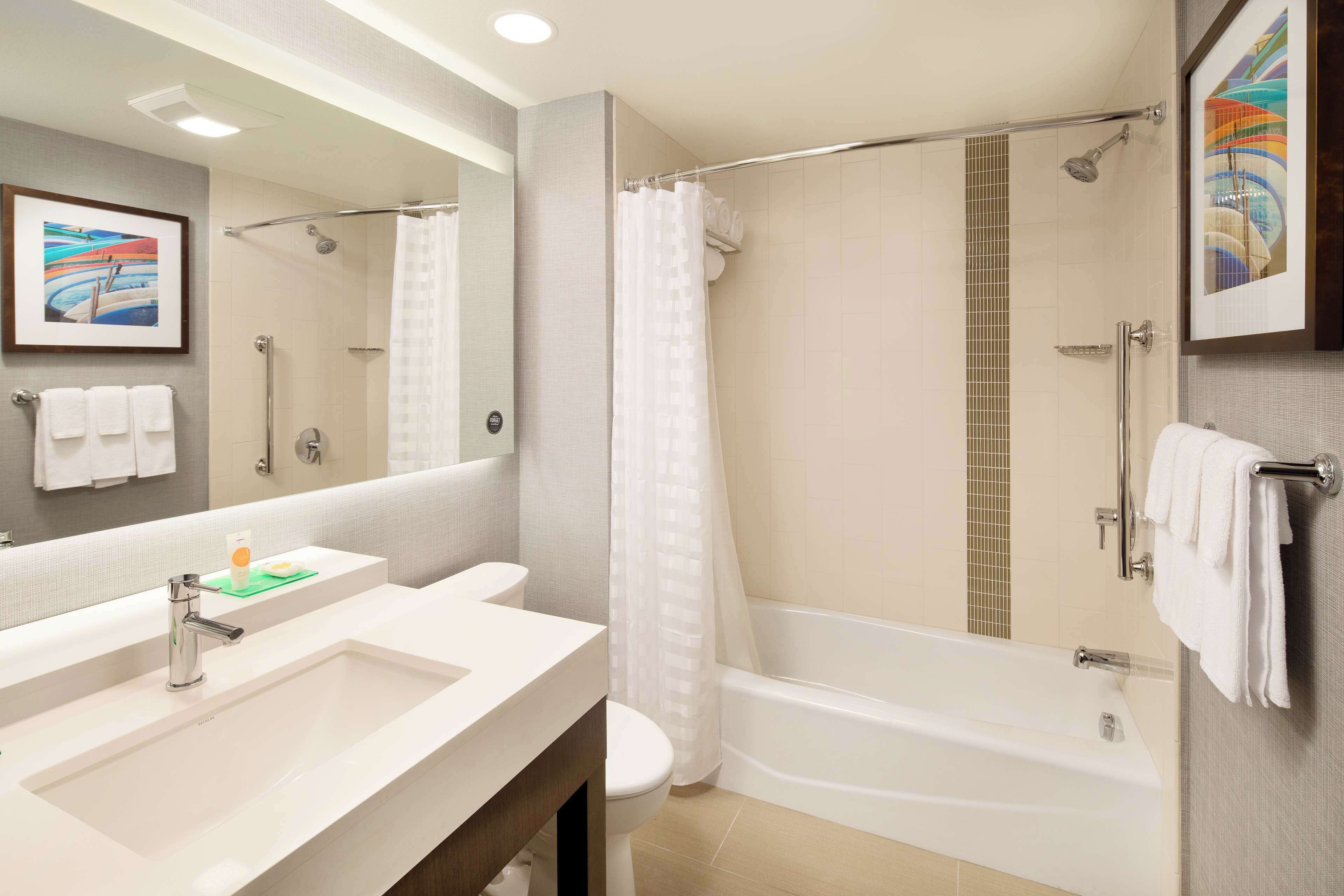 shower, designer toiletries, towels