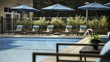 Outdoor pool, open 10:00 AM to 10:00 PM, pool umbrellas, pool loungers