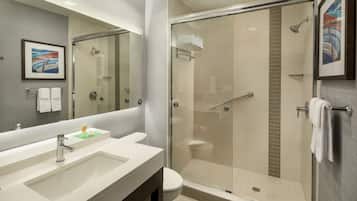 Shower, designer toiletries, towels