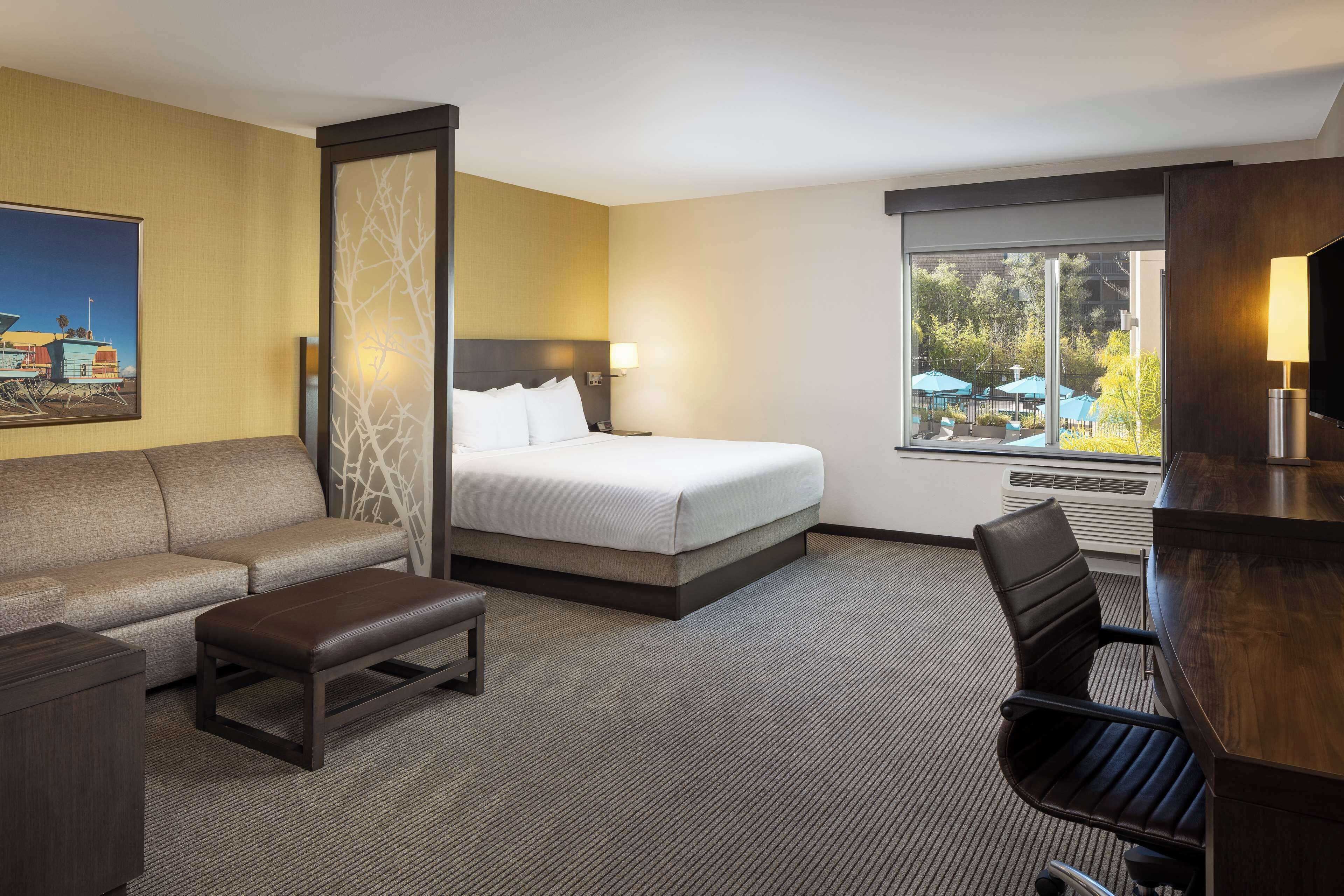 in-room safe, desk, blackout curtains, iron/ironing board