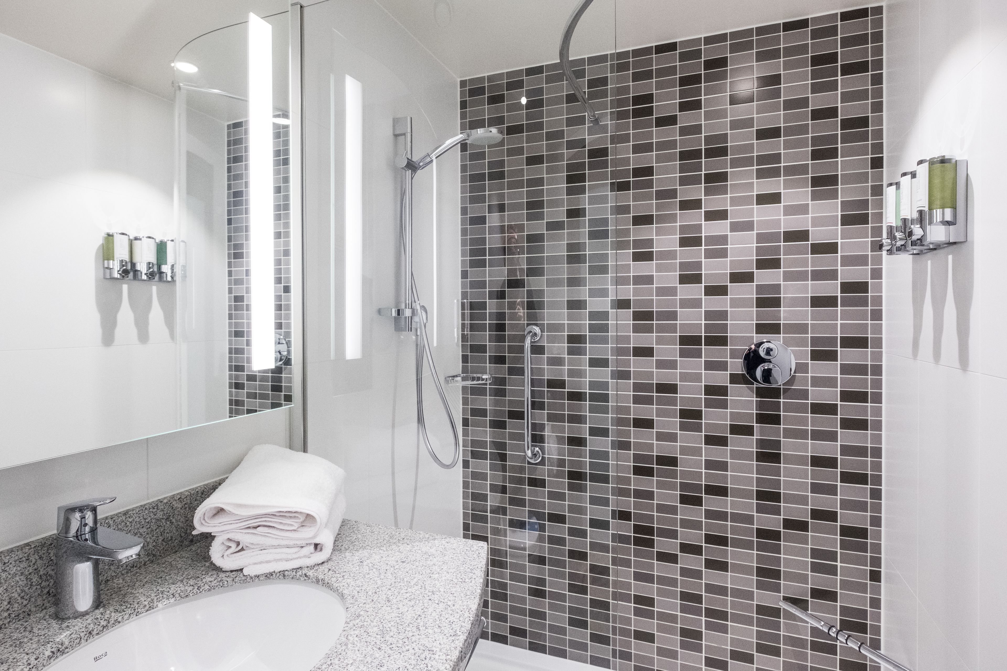 shower, free toiletries, hair dryer, towels