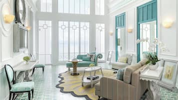 Executive Suite, 1 King Bed with Sofa bed (Balcony) | Living area | 32-inch LCD TV with satellite channels, TV, books