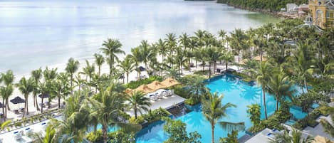 3 outdoor pools, open 6:30 AM to 6:30 PM, pool umbrellas, pool loungers